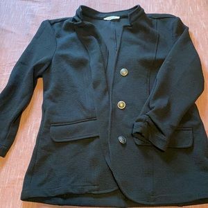 3. Black blazer with button front